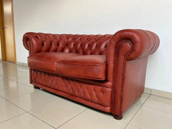 Image 1 of English Chesterfield Sofa Pair – Paprika Red Leather (Fully Restored, Rare Colour)