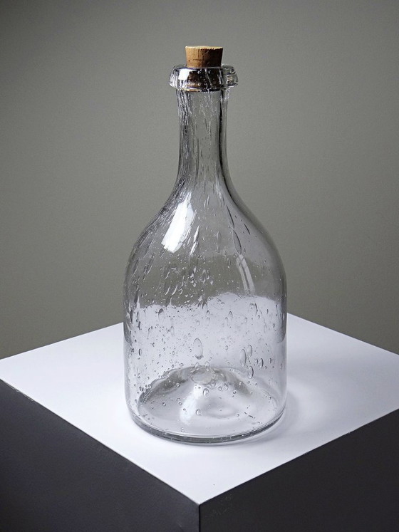 Image 1 of Large antique bottle in blown glass with bubbles, early 20th century, 1900-1920