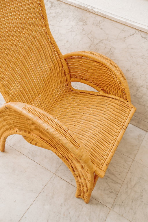 Large Rattan Armchair With Crescent Legs