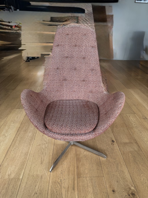 Fauteuil pivotant Ghost High en tissu + repose-pieds