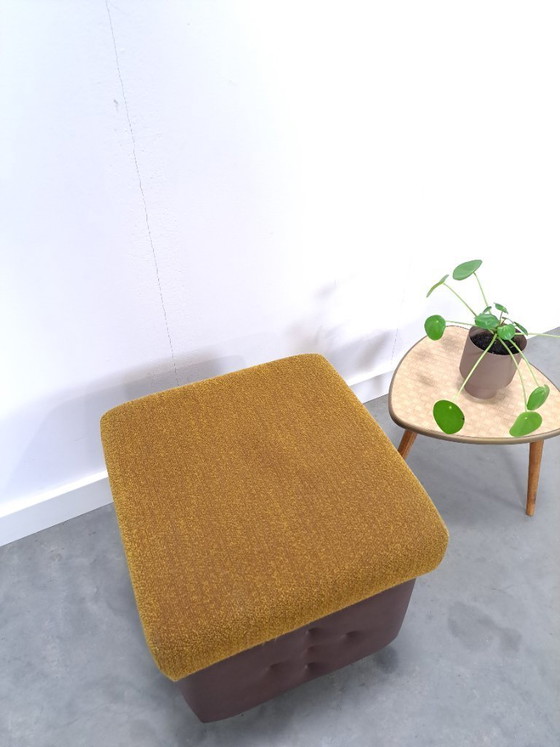 Image 1 of Ottoman with lid on chrome wheels