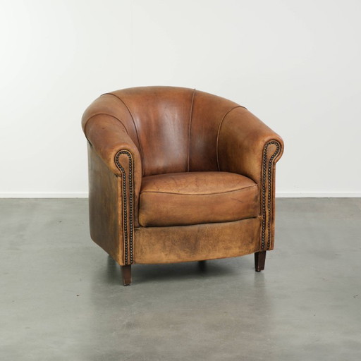 Schöner Vintage Schafsleder Club-Sessel in einer schönen Cognac-Farbe mit robuster Ausstrahlung
