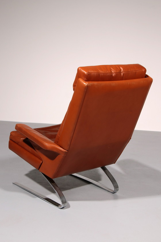 Image 1 of Cognac Leder COR Swing Lounge Stuhl mit Ottomane von Adolf & Schöpfer 1976
