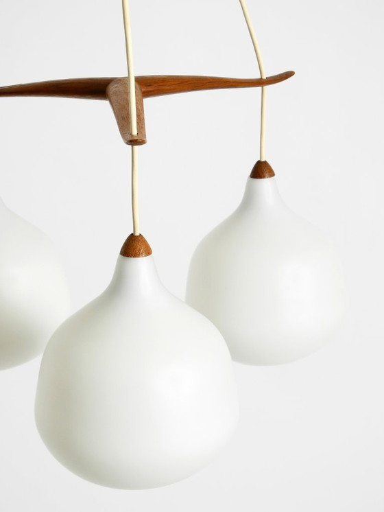 Image 1 of Beautiful pendant lamp with three opal glass shades and a teak frame by Uno & Östen Kristiansson for Luxus Vittsjö, Sweden 1957
