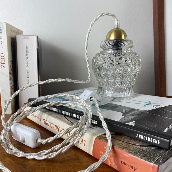 Image 1 of Lámpara portátil antigua de globo en vidrio transparente