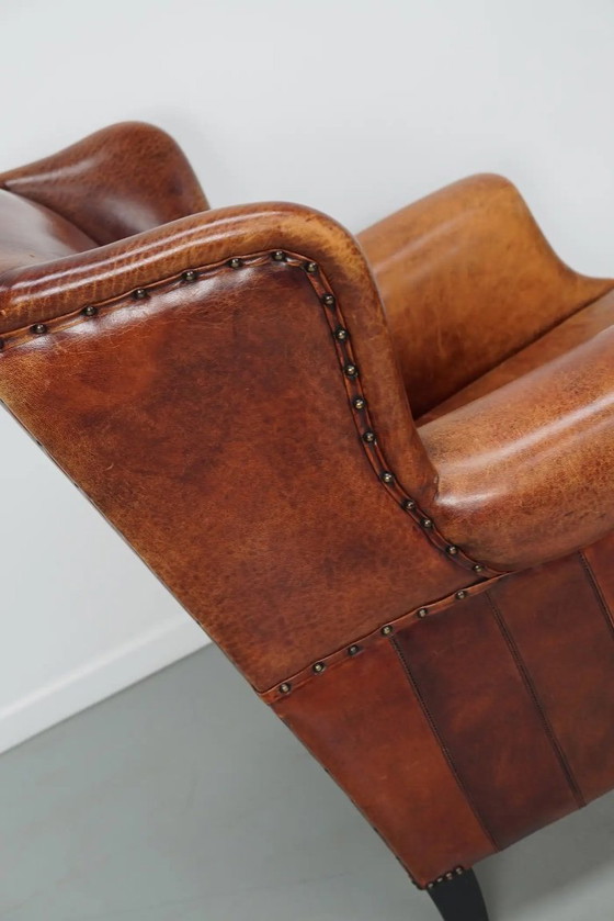 Image 1 of Vintage Nederlandse clubfauteuil in cognackleurig leer