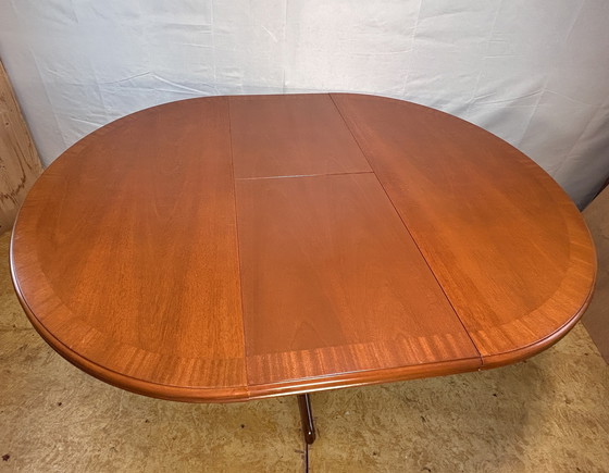 Image 1 of Mid-Century Retro Vintage Teak Extending Round Dining Table by Parker Knoll – 1970  Elegant | Space-Saving | Practical | Iconic 