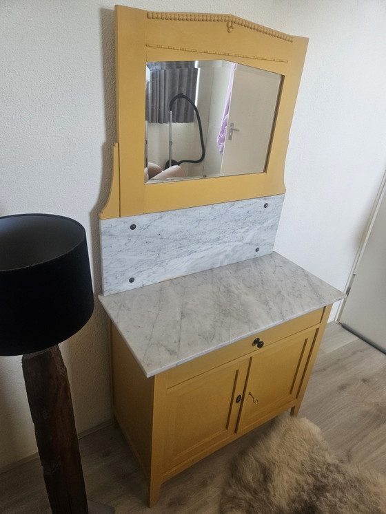 Image 1 of Vintage ochre yellow sideboard with marble top and mirror