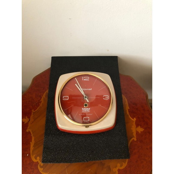 Image 1 of Vintage hes wall clock in heavy metal case, India