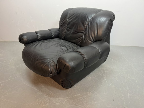 Image 1 of Beautiful Big Black Leather Postmodern Italian Design Space Age Lounge Chair with Brass Buttons and Playful Cord Lacing, 1970s.