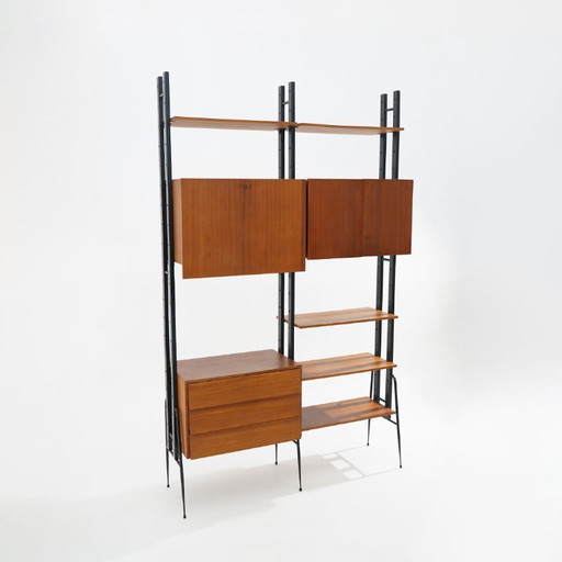 Modular bookcase with wooden uprights, 1950s