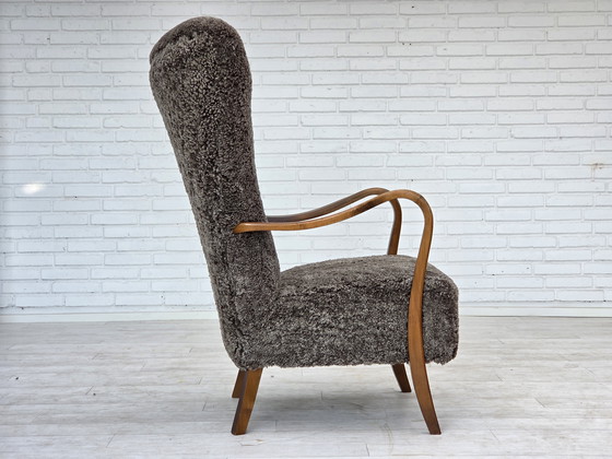 Image 1 of 1960s Reupholstered Danish Armchair with Stool, Genuine Sheepskin