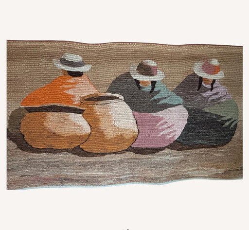 Hand-woven wall hanging in earth tones