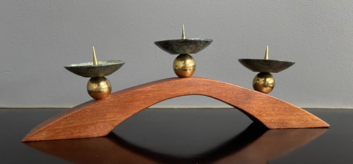 teak and brass candle holder 