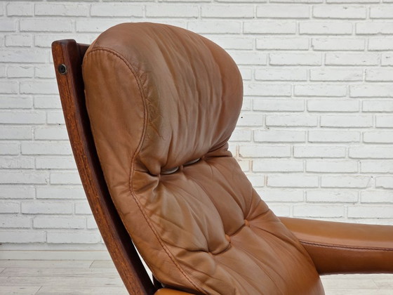 Image 1 of Años 70, diseño sueco de Gote Möbler, silla giratoria con reposapiés, cuero.