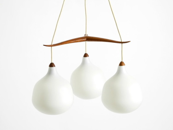 Image 1 of Beautiful pendant lamp with three opal glass shades and a teak frame by Uno & Östen Kristiansson for Luxus Vittsjö, Sweden 1957