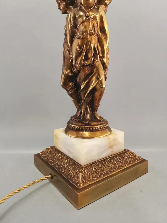 Image 1 of Vintage Deknudt 3 graces table lamp