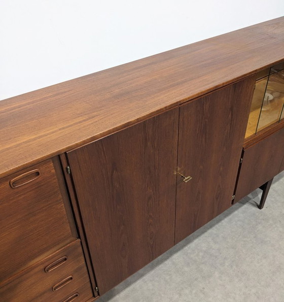 Image 1 of Lang dressoir uit het midden van de vorige eeuw, O.M.F.