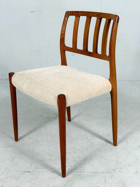 Image 1 of JL Møllers, ensemble de 4 chaises de salle à manger, modèle '83', teck, laine, années 1960, Danemark (4)