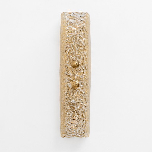 Coppia di applique in vetro di Murano con grana dorata e ottone.