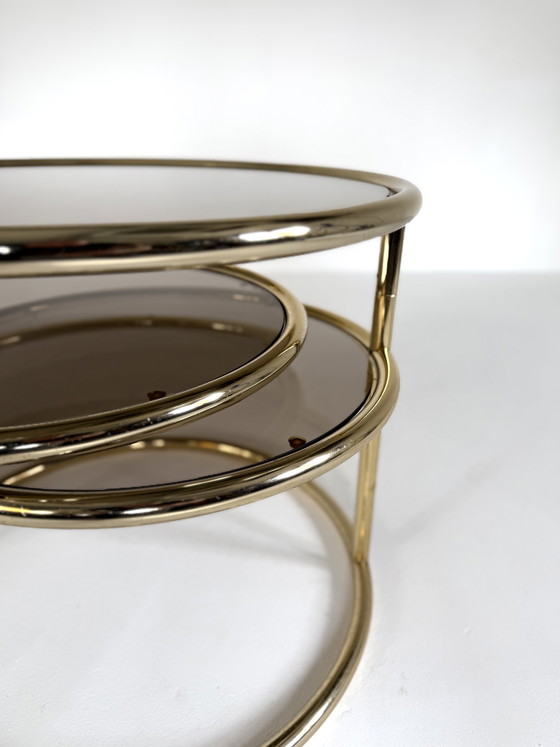 Image 1 of Vintage swivel brass & smoked glass coffee table, 1970s