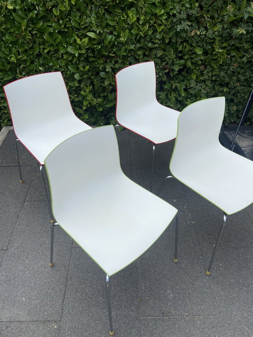 Arper Cartifa dining chairs (red and lime green)