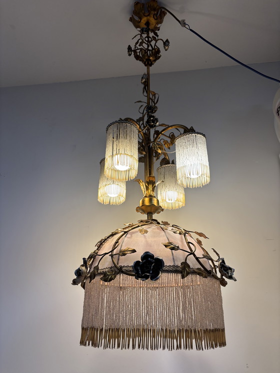 Image 1 of Exclusive chandelier with brass leaves and silver-colored roses