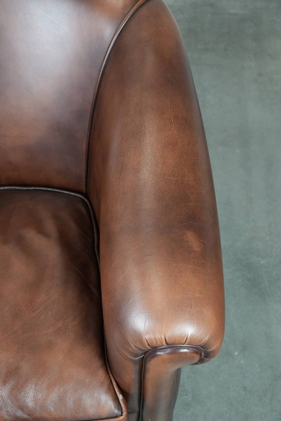 Image 1 of Luxuriöser Club-Sessel aus braunem Kuhfell mit korrekter Verarbeitung