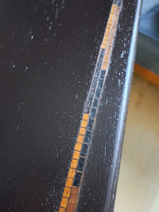 Image 1 of Mesa con base de hierro fundido.