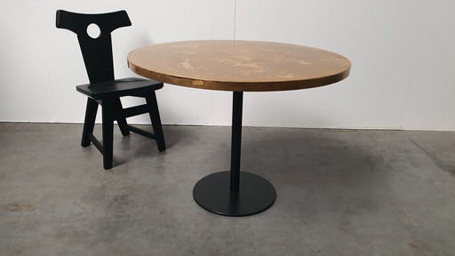Brass patinated table round wabi sabi cast iron base Pedrali