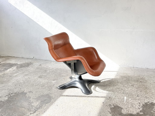 Fauteuil Karuselli des années 70, design Yrjö Kukkapuro en cuir cognac