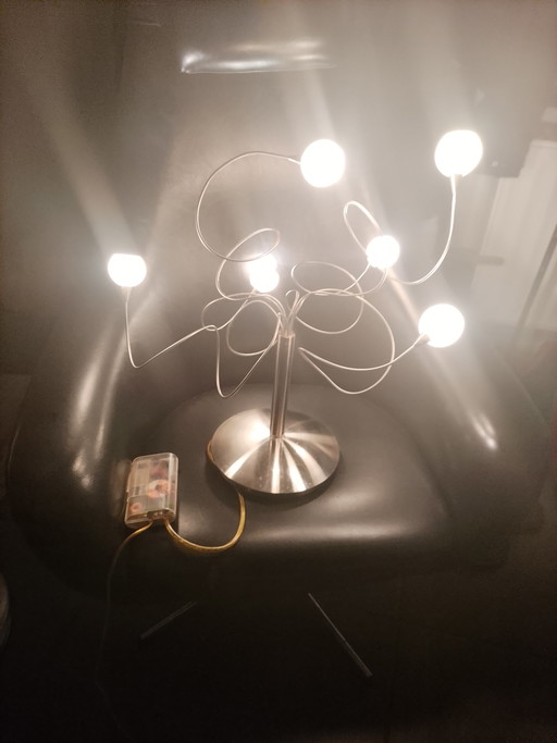 Modern design table lamp in brushed chrome metal with 6 lights and dimmer