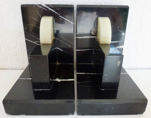 Art Deco boekensteunen.