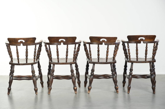 Image 1 of 4 x Antique wooden English pub/captain chairs from the late 19th century with character