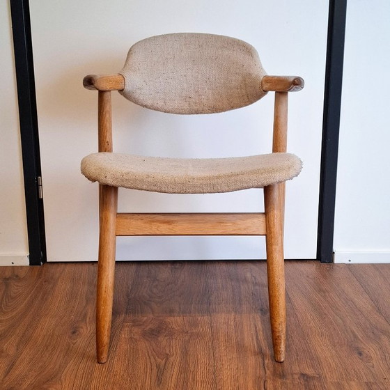 Image 1 of Sedia in corno di mucca con seduta e schienale in tessuto