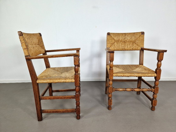 Image 1 of Vintage Franse Armleuningstoelen | Eiken en Riet