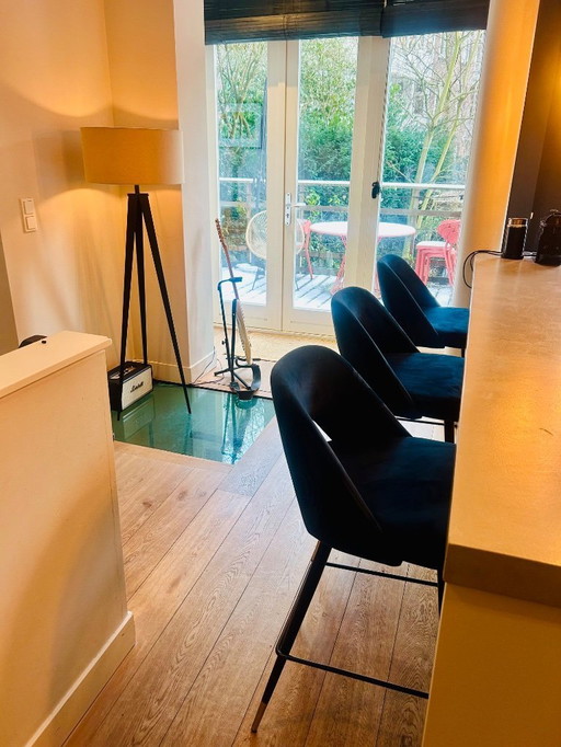 3 tabourets de bar Eichholtz