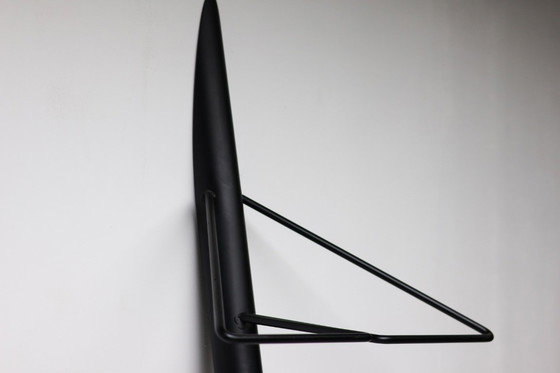 Image 1 of Modern, sleek black coat rack. Stylish and sturdy.