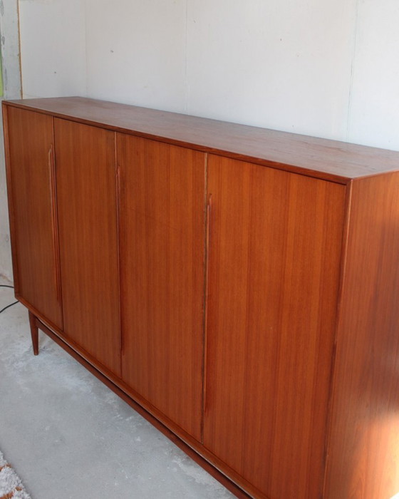 Image 1 of XXL teak highboard, German design classic by Heinrich Rietsenpatt
