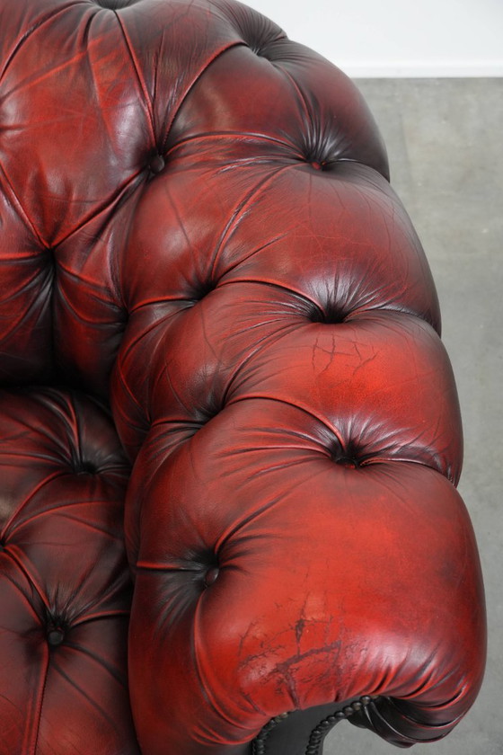 Image 1 of Rode rundleren chesterfield buttonseat fauteuil