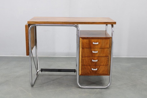Escritorio infantil Bauhaus de los años 30 con hojas abatibles en nogal y cromo