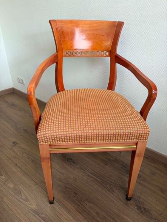 Image 1 of round wooden dining table with glass top and 4 matching chairs
