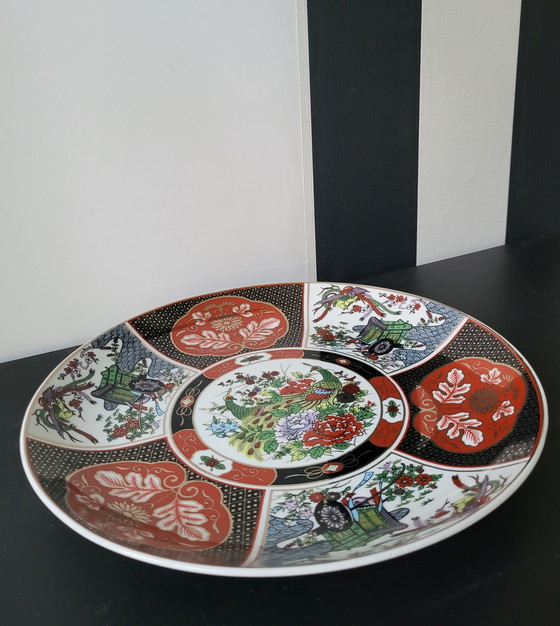 Image 1 of Piatto giapponese in ceramica Imari con motivo a pavone.