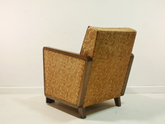 Image 1 of Vintage fauteuil uit de jaren 50, originele mid-century modern stijl, houten armleuningen, vering, bloemenstof, Duitsland
