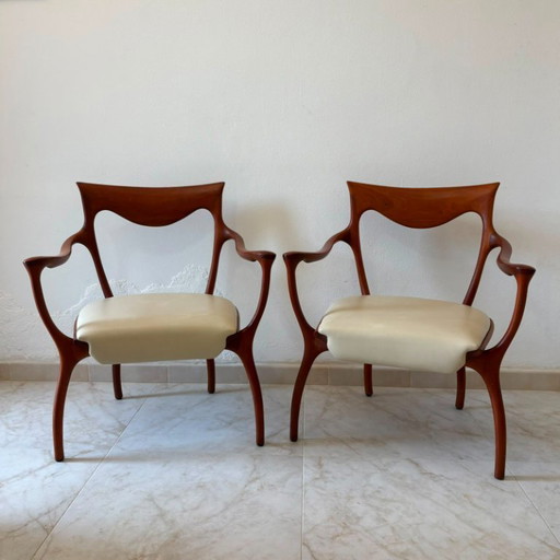 Een paar Hypnos-fauteuils uit de Ceccotti-collectie. – Wood, Leather