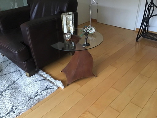 2 small tables and 1 large table and a cupboard