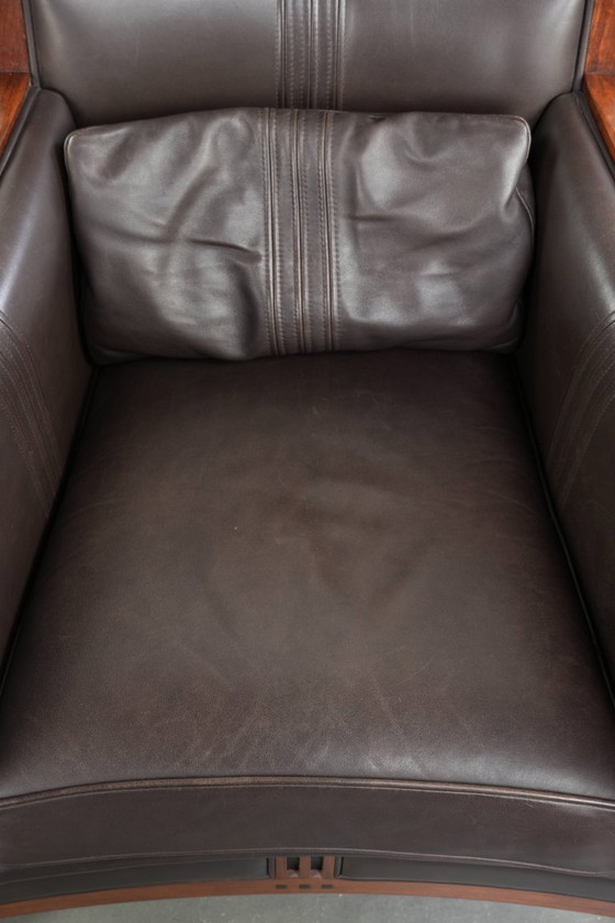 Image 1 of Luxe Schuitema Art Deco design set bestaande uit een fauteuil en hocker uit de Decoforma serie in chocolade bruin rundleer