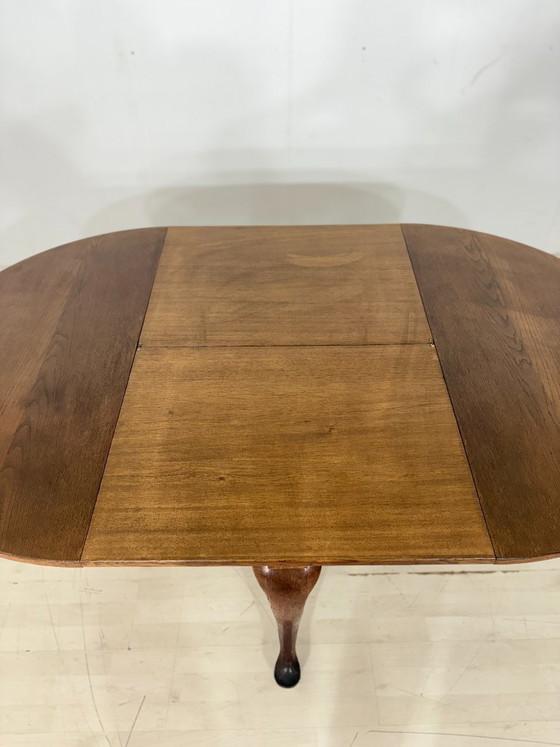 Image 1 of Classic Chippendale dining table – Round extendable table made of solid wood with timeless elegance