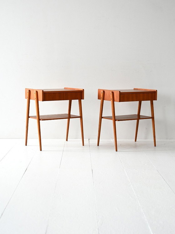 Image 1 of Paar vintage Scandinavische teakhouten nachtkastjes met verborgen lade