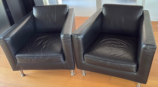 Sillones Minotti de cuero negro